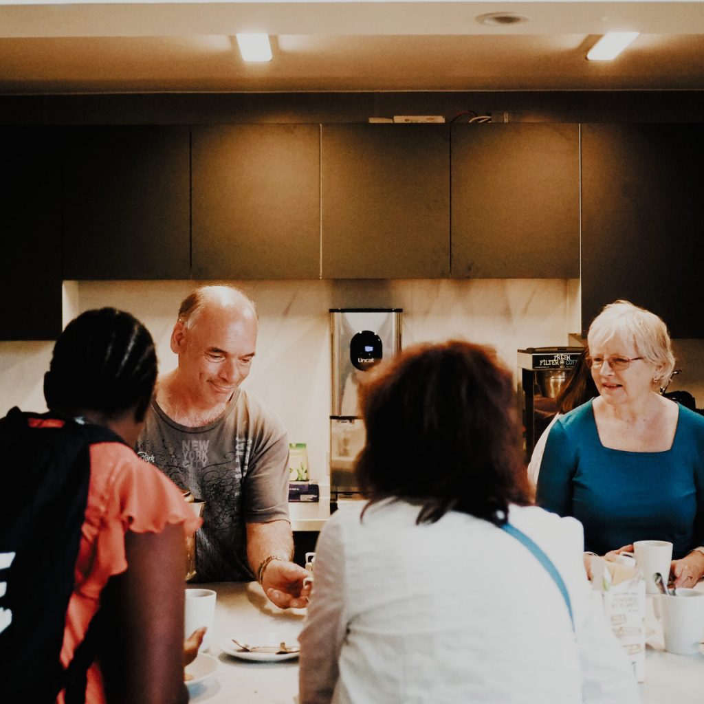 people meeting over coffee